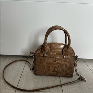 Brown Crossbody Bag with Textured Exterior and Structured Shape